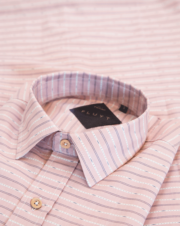 <transcy>Pink Shirt with white ethnic stripes</transcy>